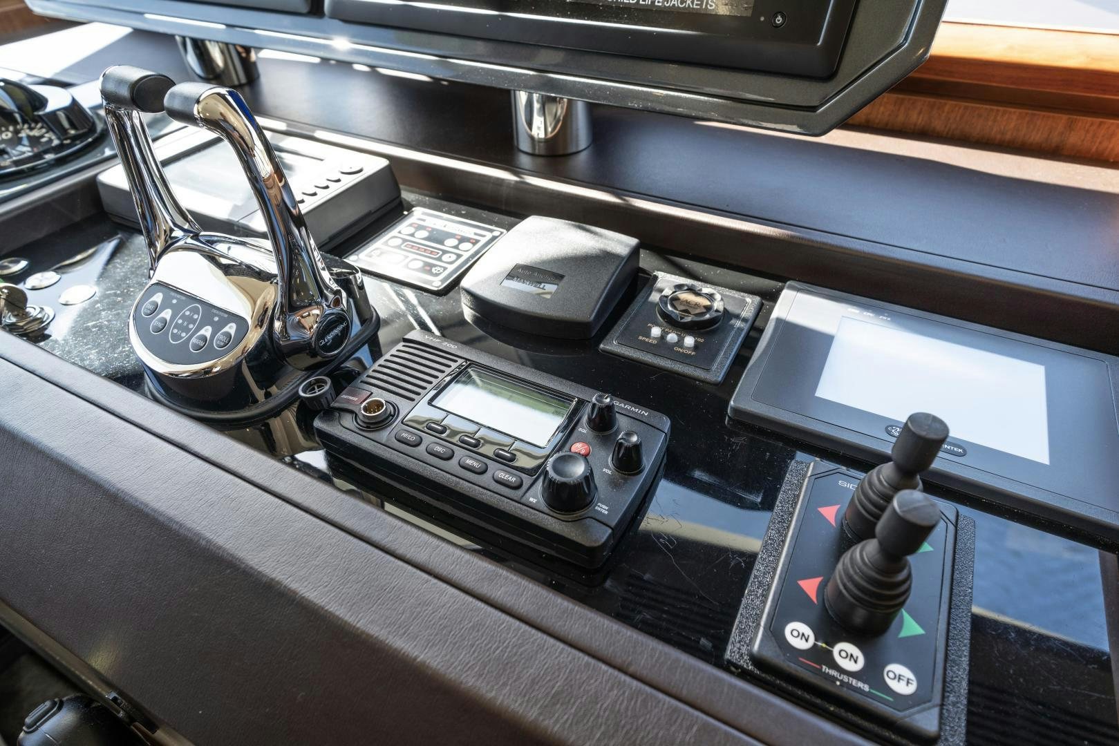 a group of cell phones on a table aboard SANCTUARY Yacht for Sale