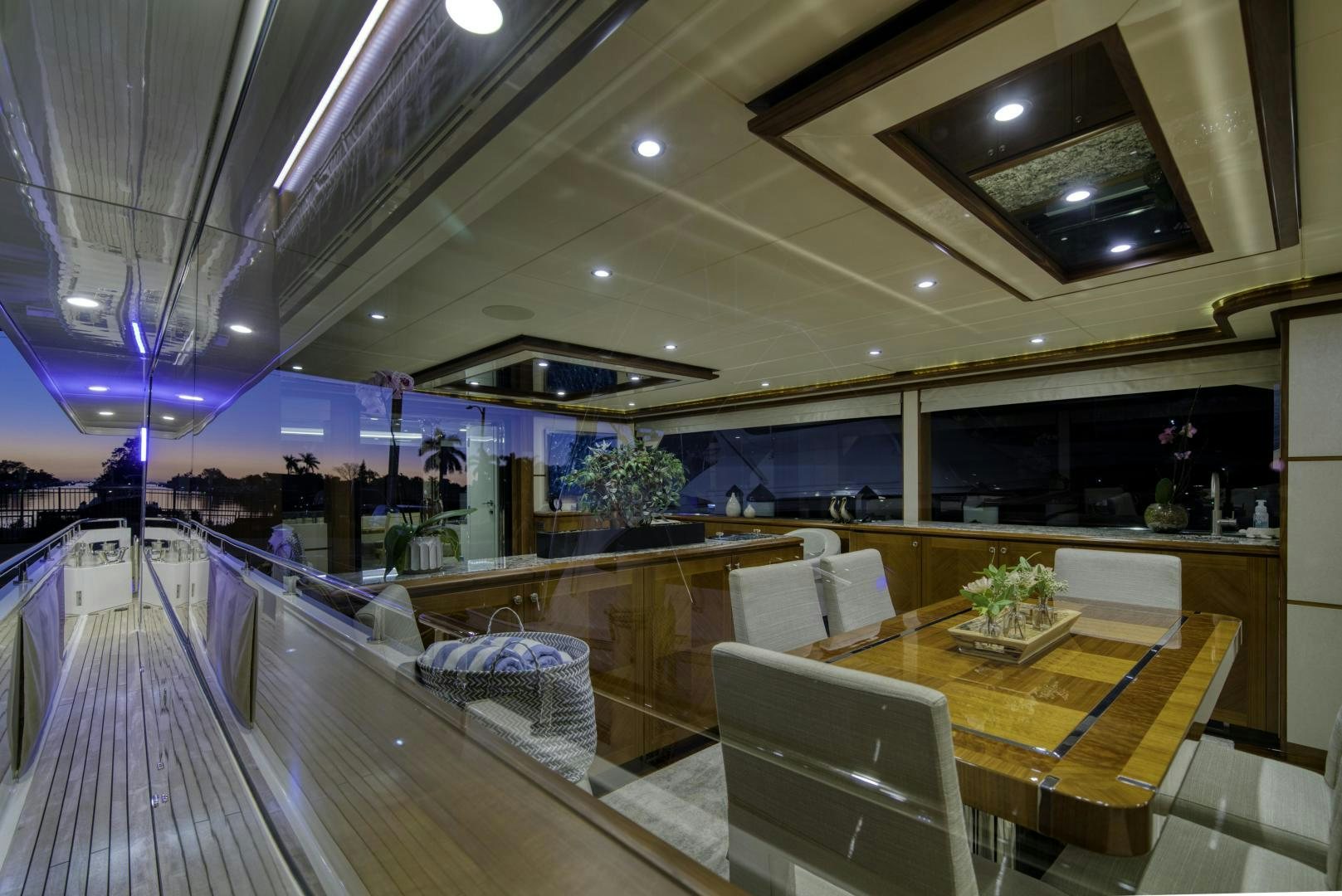 a room with a table and chairs aboard SANCTUARY Yacht for Sale