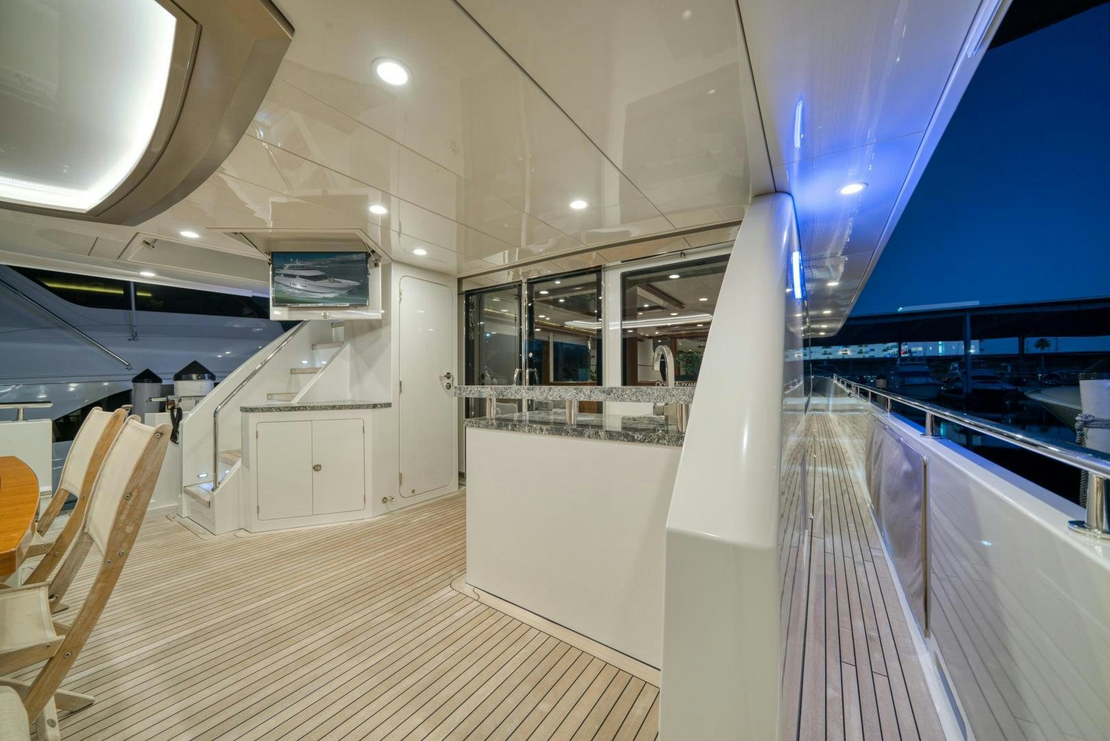 a long hallway with white walls aboard SANCTUARY Yacht for Sale