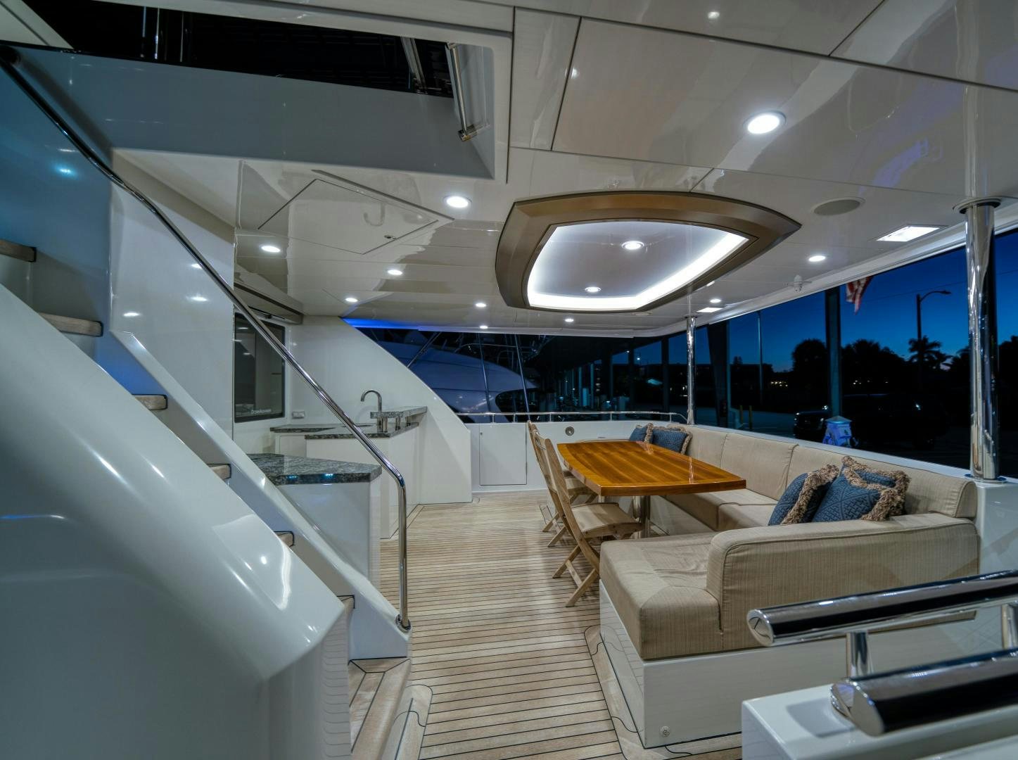 a room with a couch and a table and chairs aboard SANCTUARY Yacht for Sale
