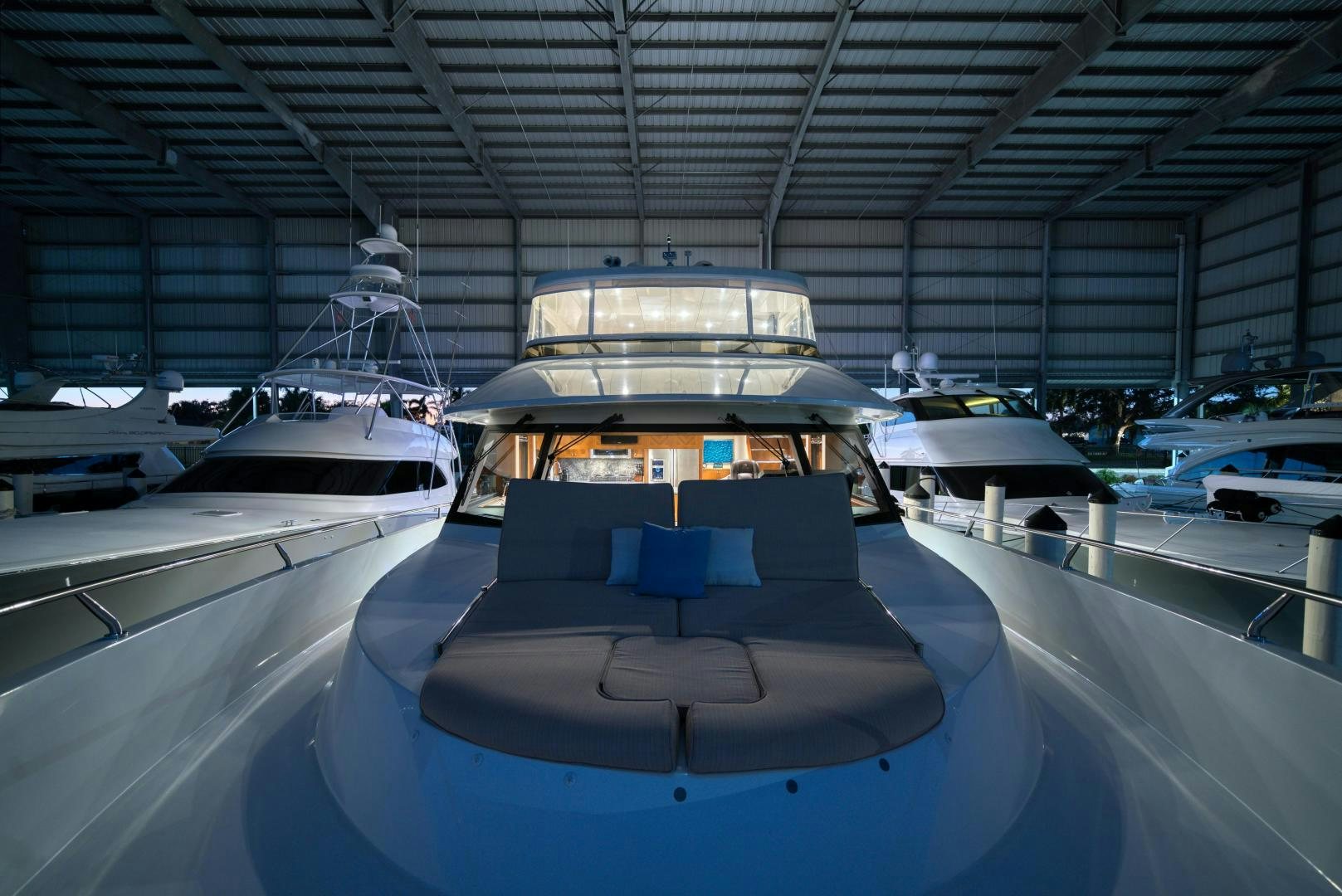 a group of boats in a large building aboard SANCTUARY Yacht for Sale