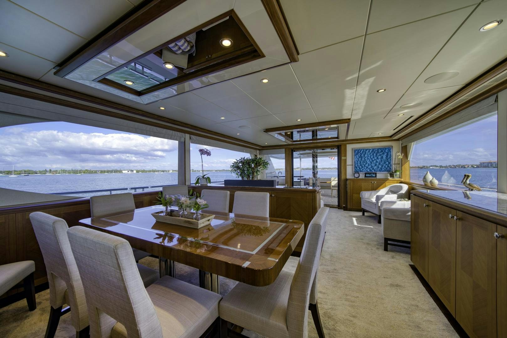 a room with a table and chairs aboard SANCTUARY Yacht for Sale