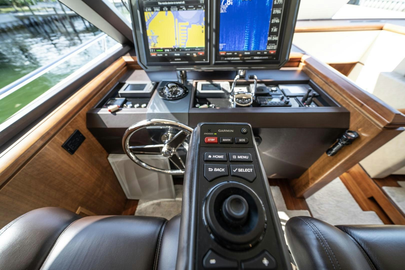 a video game console and a video game console on a table aboard SANCTUARY Yacht for Sale
