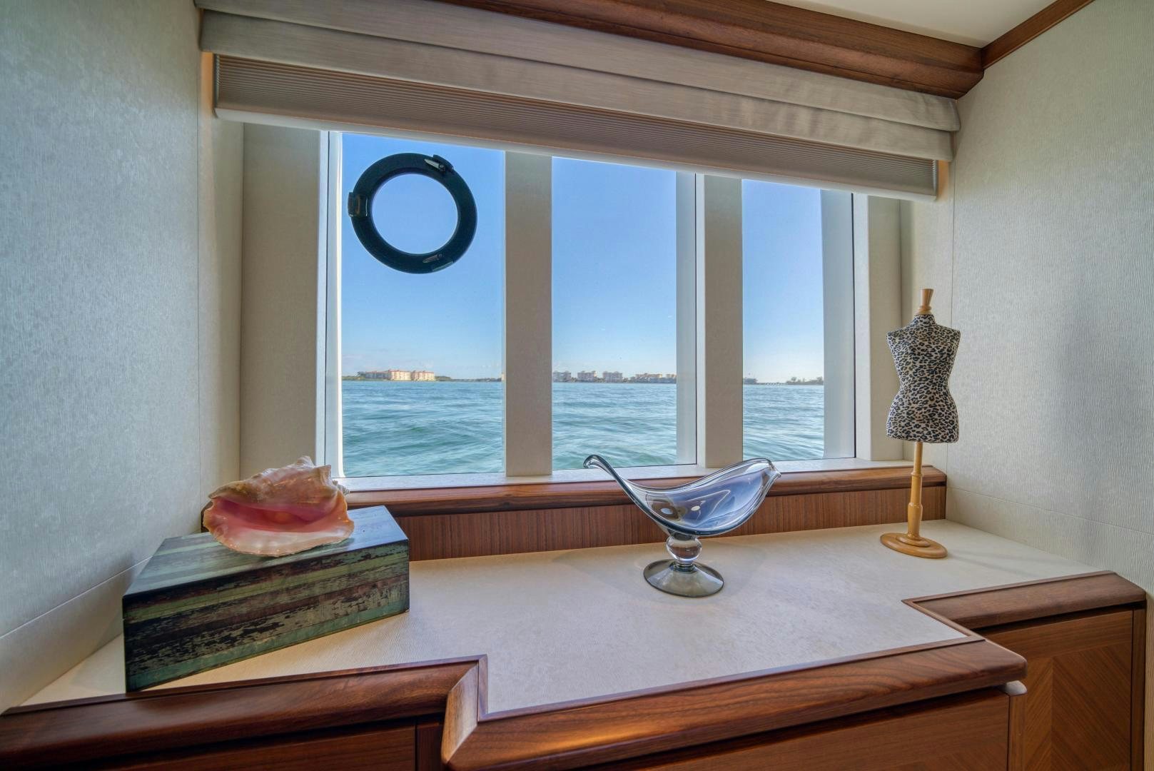 a room with a table and a window aboard SANCTUARY Yacht for Sale