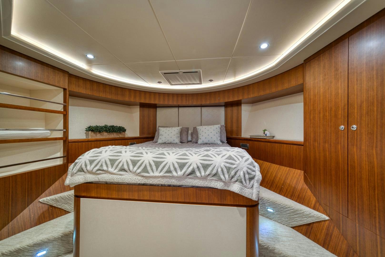 a room with a bed and a shelf aboard SANCTUARY Yacht for Sale