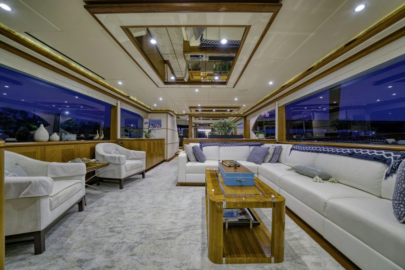a living room with a large window aboard SANCTUARY Yacht for Sale