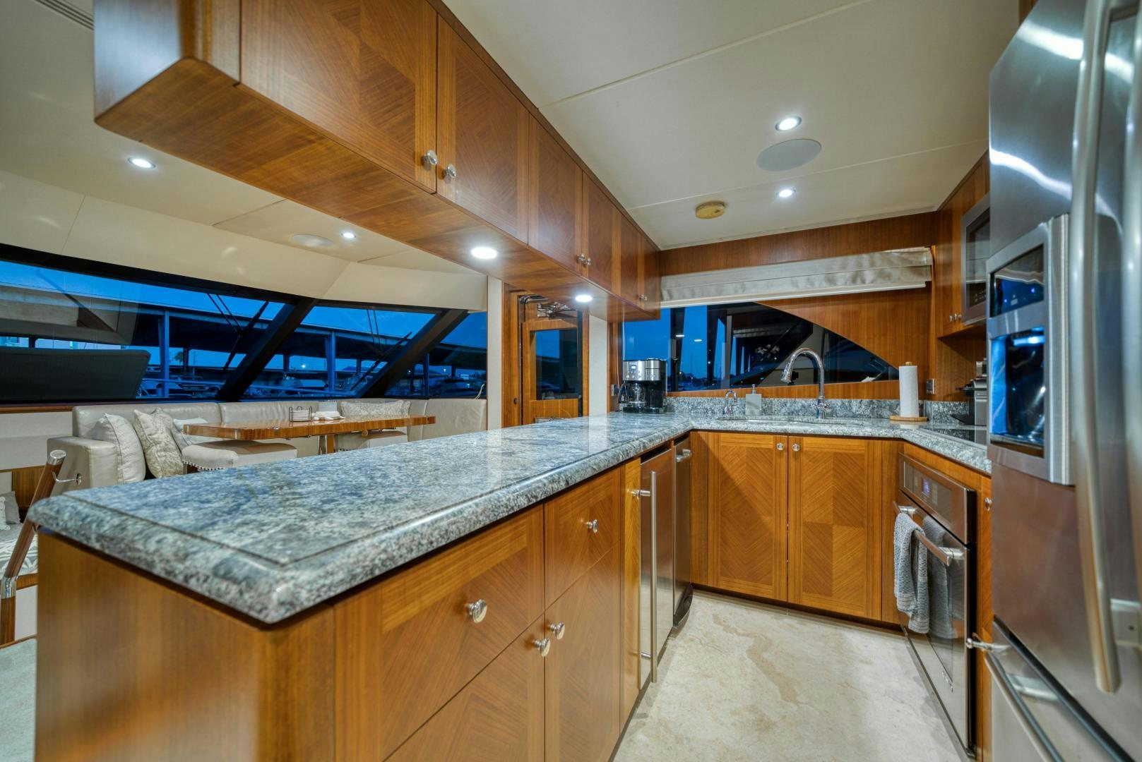 a kitchen with a large island aboard SANCTUARY Yacht for Sale
