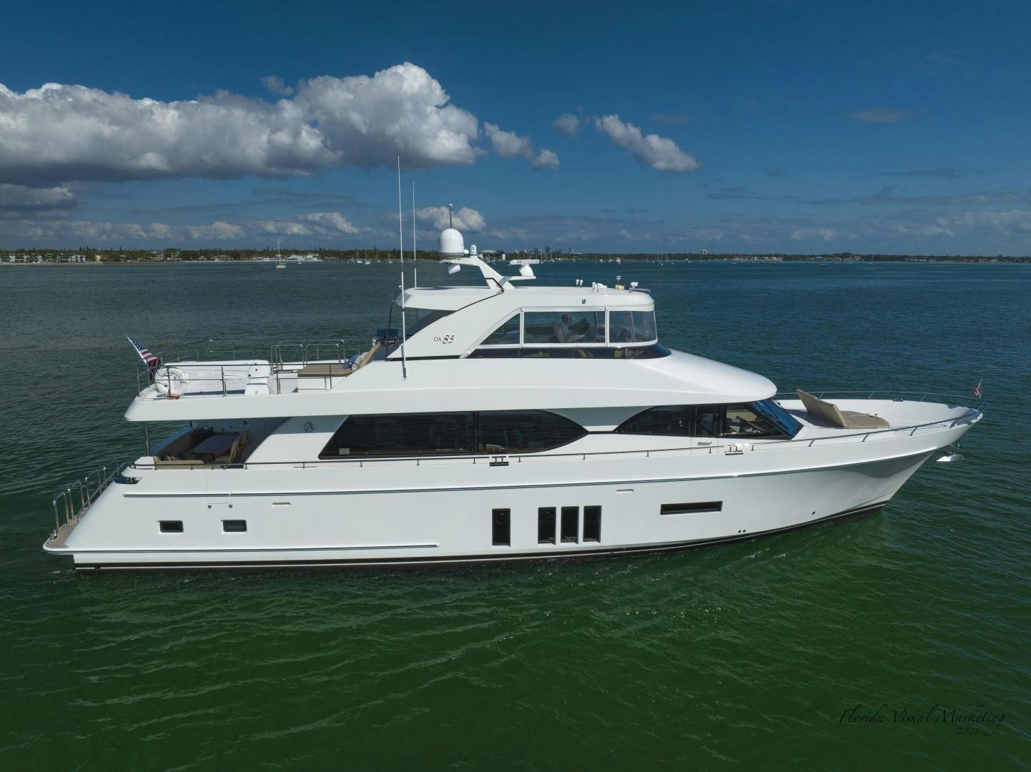 a white yacht in the water aboard SANCTUARY Yacht for Sale