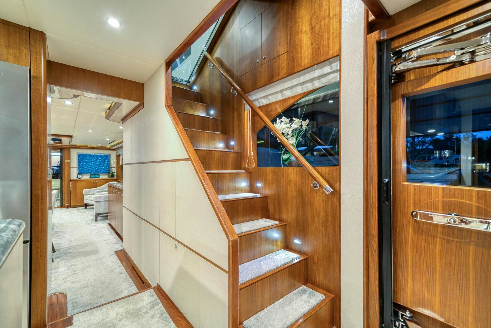 a wooden staircase in a house aboard SANCTUARY Yacht for Sale