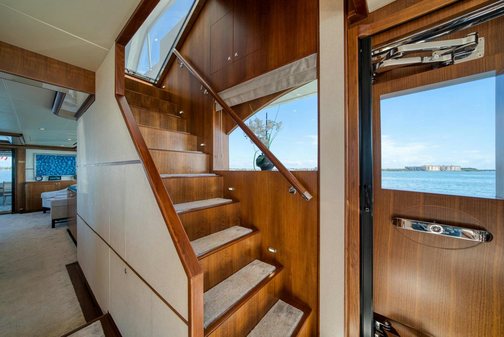 a wooden staircase in a room aboard SANCTUARY Yacht for Sale