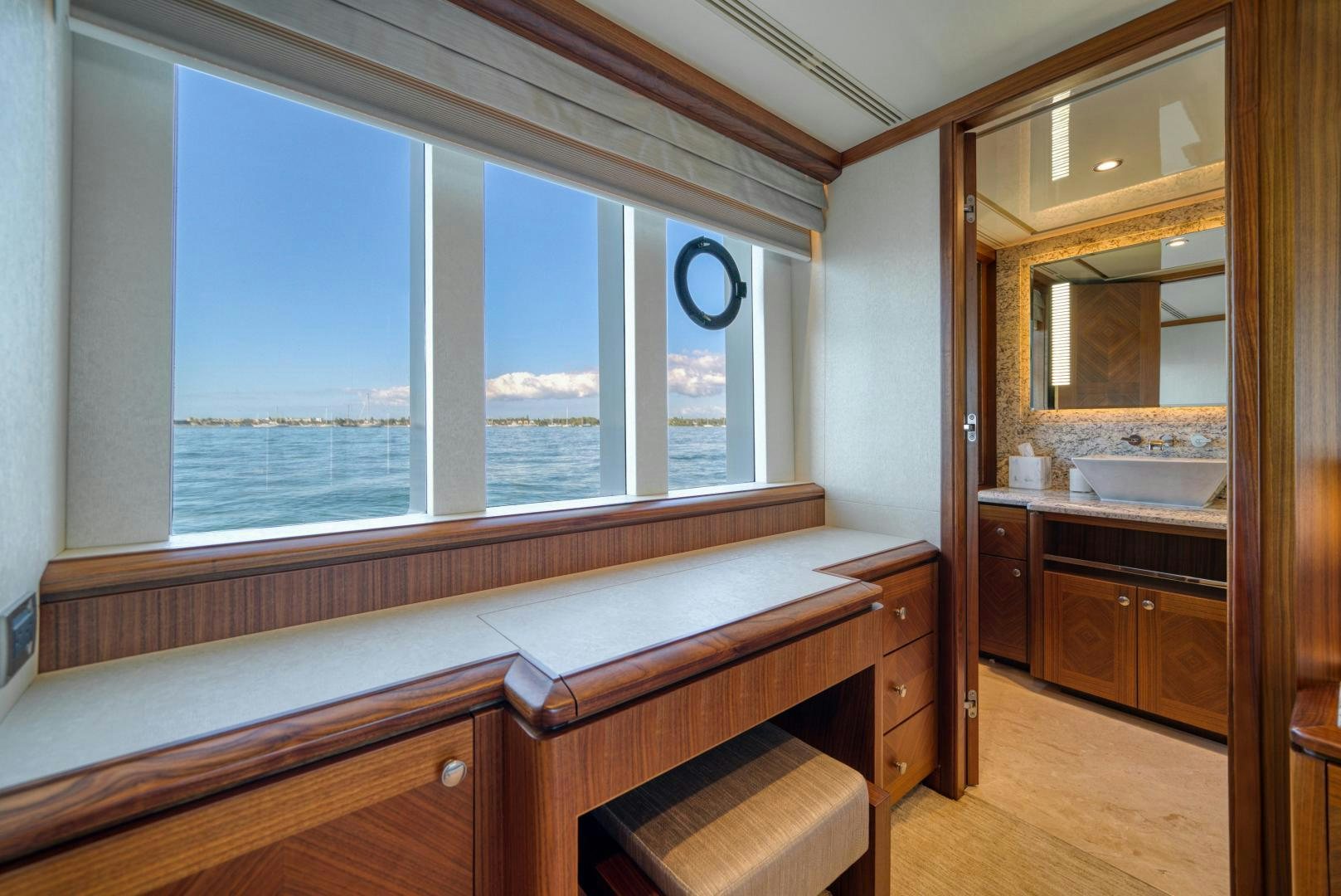 a bathroom with a large window aboard SANCTUARY Yacht for Sale