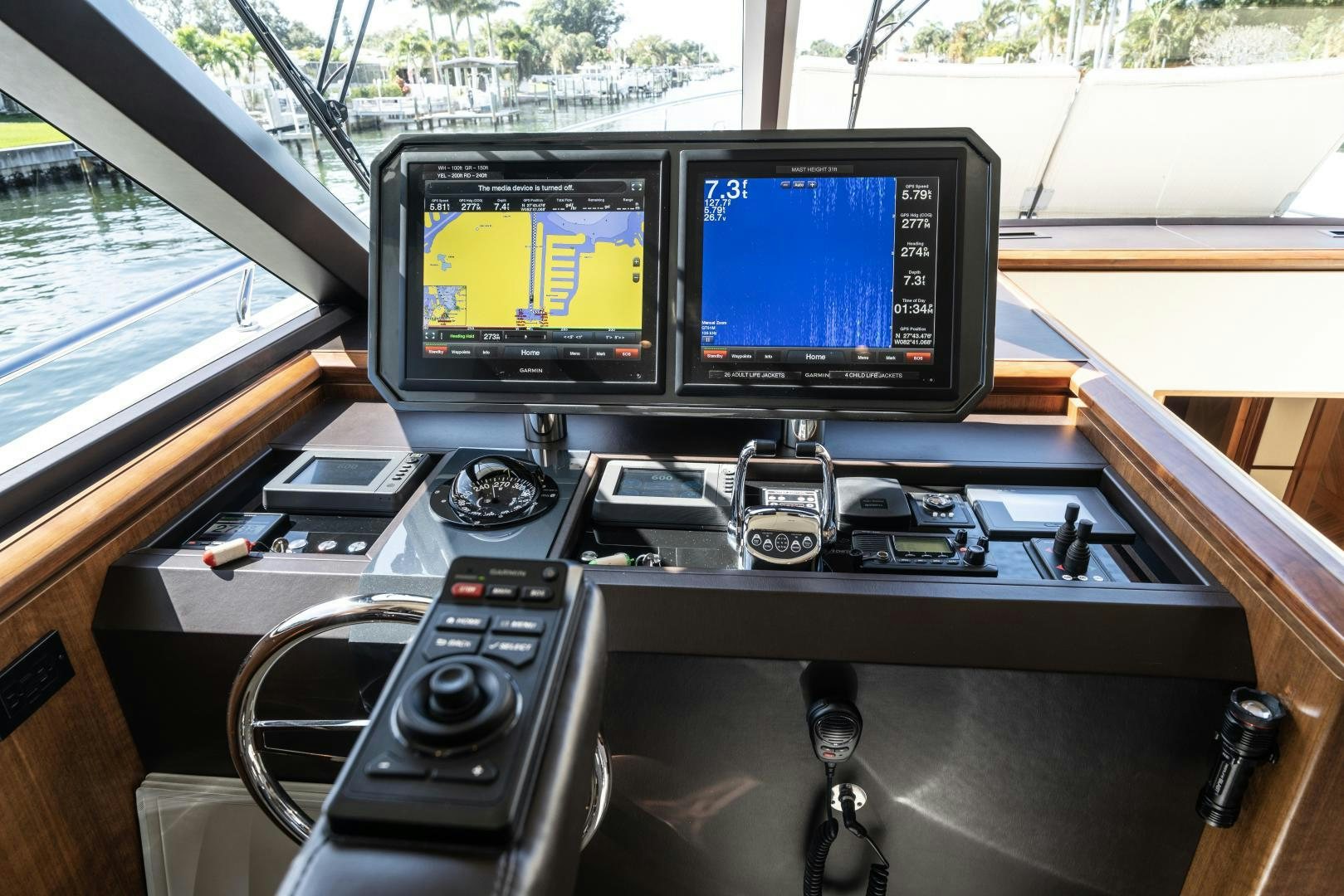 a couple of monitors on a table aboard SANCTUARY Yacht for Sale