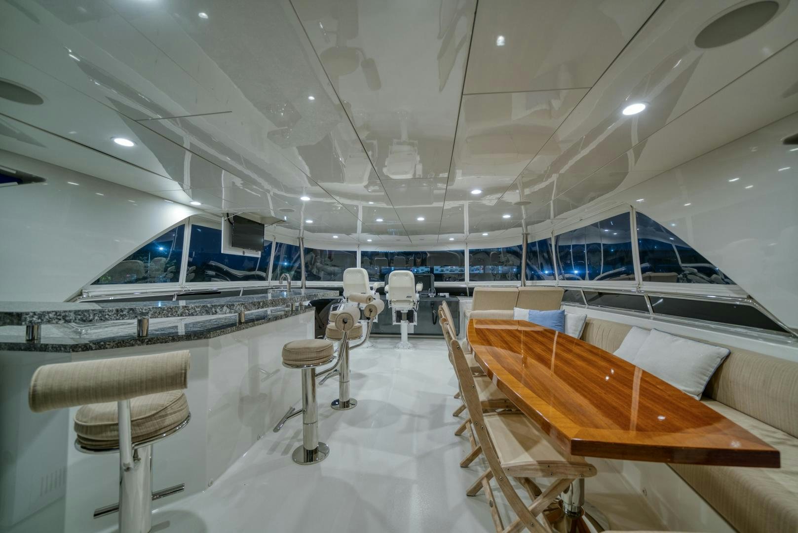 a room with chairs and tables aboard SANCTUARY Yacht for Sale