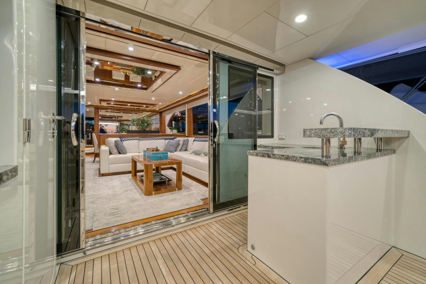 a room with a table and chairs aboard SANCTUARY Yacht for Sale