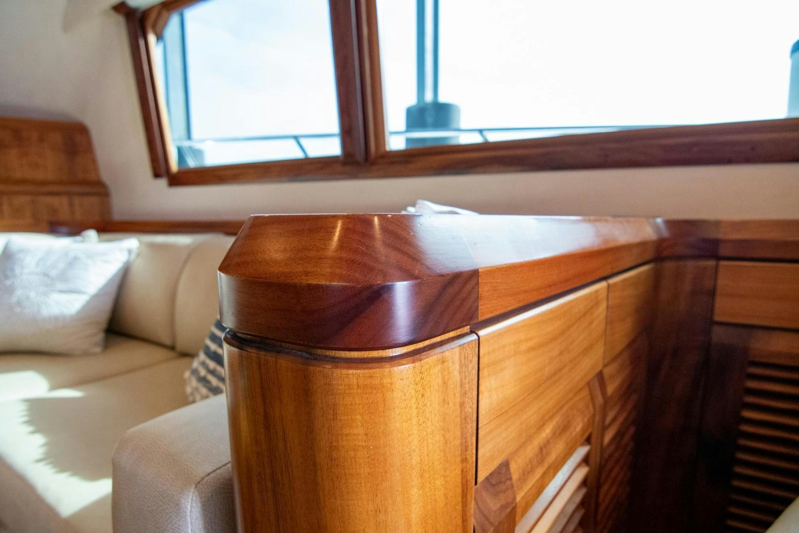 a wooden chair in a room aboard CROUPIER Yacht for Sale