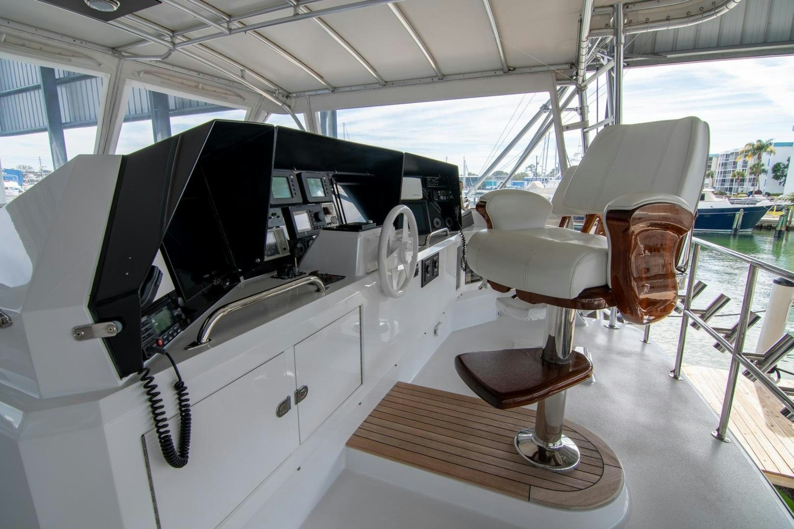 a car with a screen and a speaker on the back aboard CROUPIER Yacht for Sale