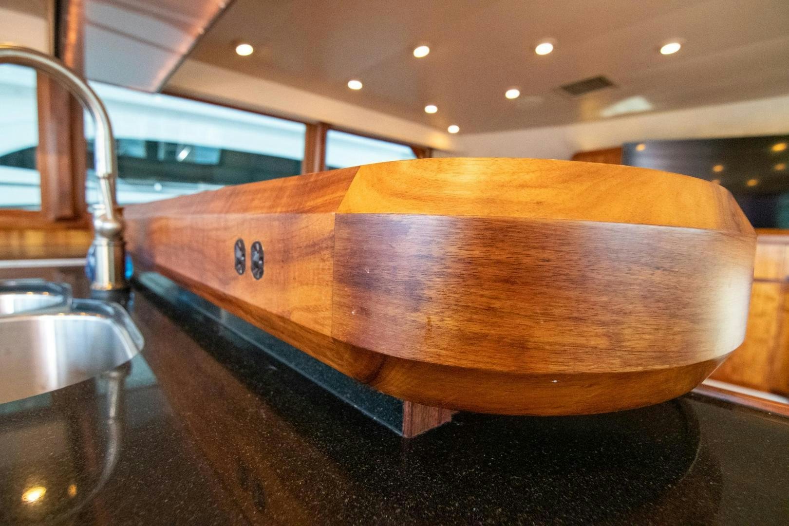 a wooden barrel on a counter aboard CROUPIER Yacht for Sale