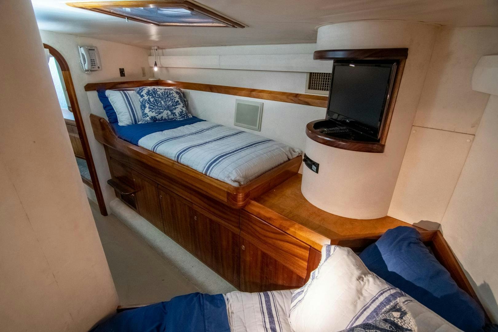 a couple of beds in a small room aboard CROUPIER Yacht for Sale