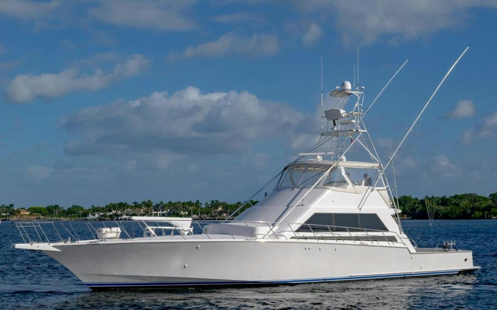 a white yacht on the water aboard CROUPIER Yacht for Sale