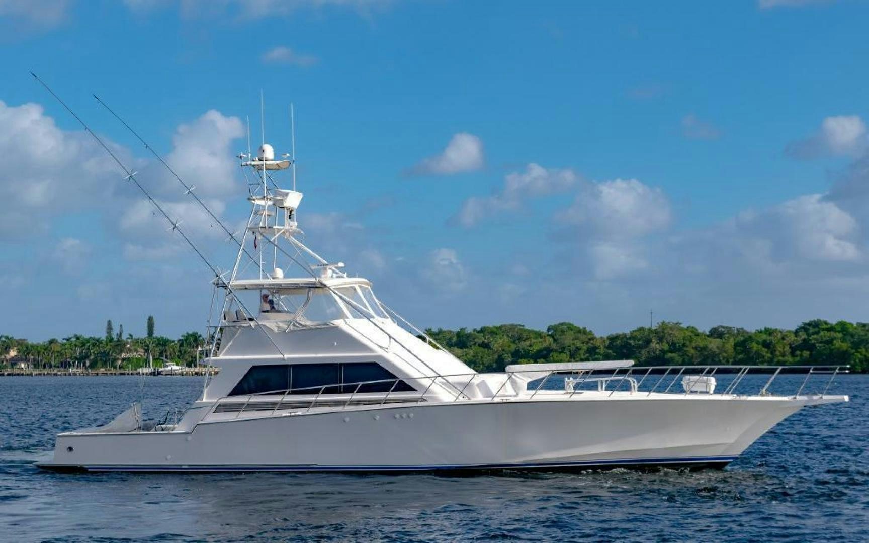 a white boat on the water aboard CROUPIER Yacht for Sale