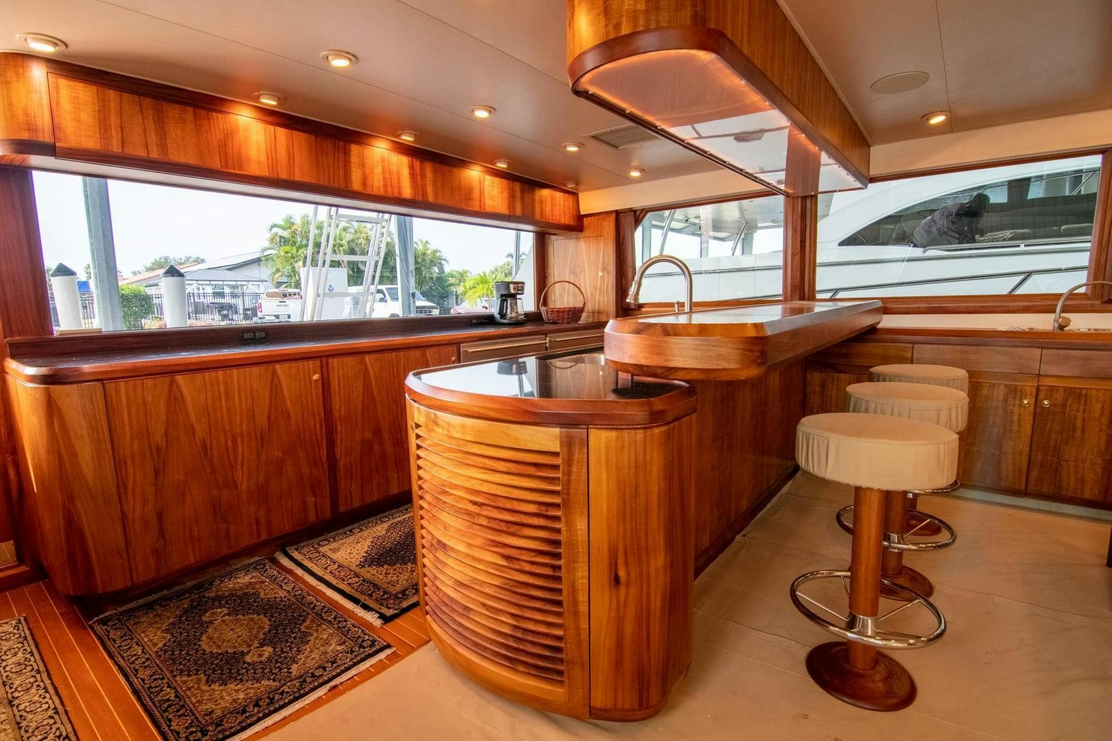a kitchen with a large island aboard CROUPIER Yacht for Sale