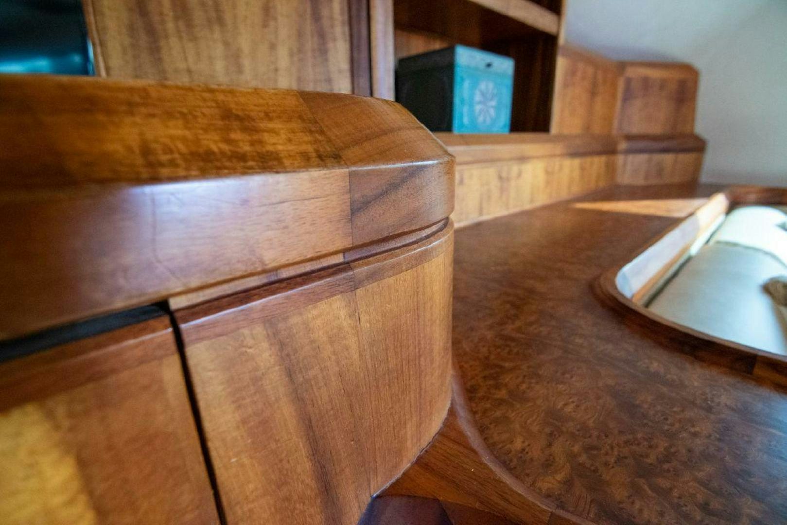 a wooden box on a table aboard CROUPIER Yacht for Sale