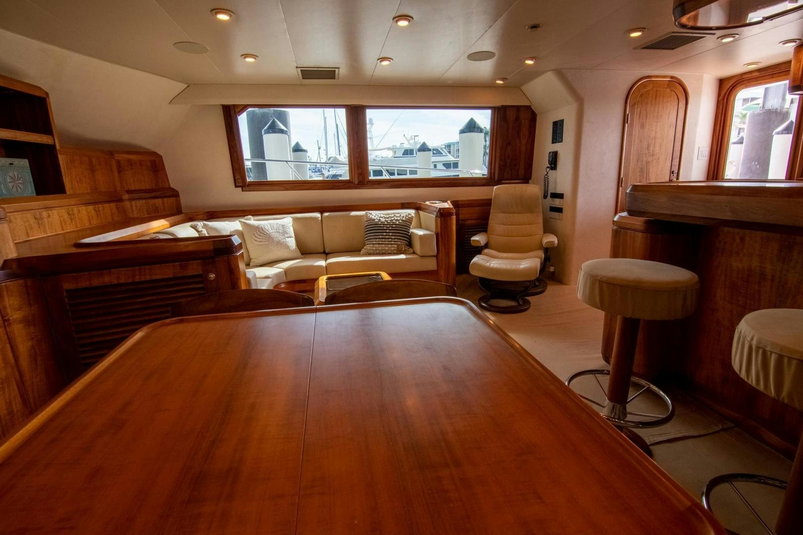 a room with a piano and a couch aboard CROUPIER Yacht for Sale