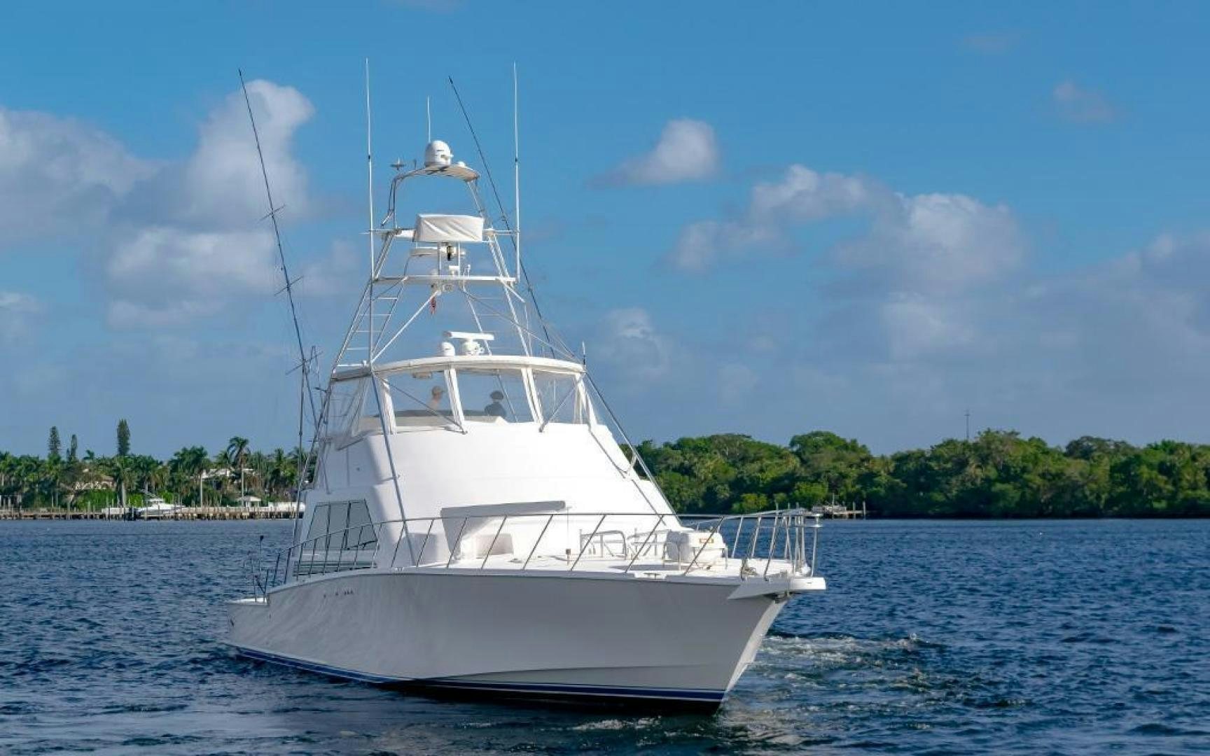 a white boat on the water aboard CROUPIER Yacht for Sale