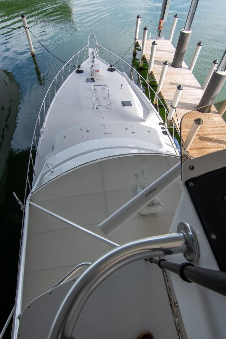 a white boat with ropes aboard CROUPIER Yacht for Sale