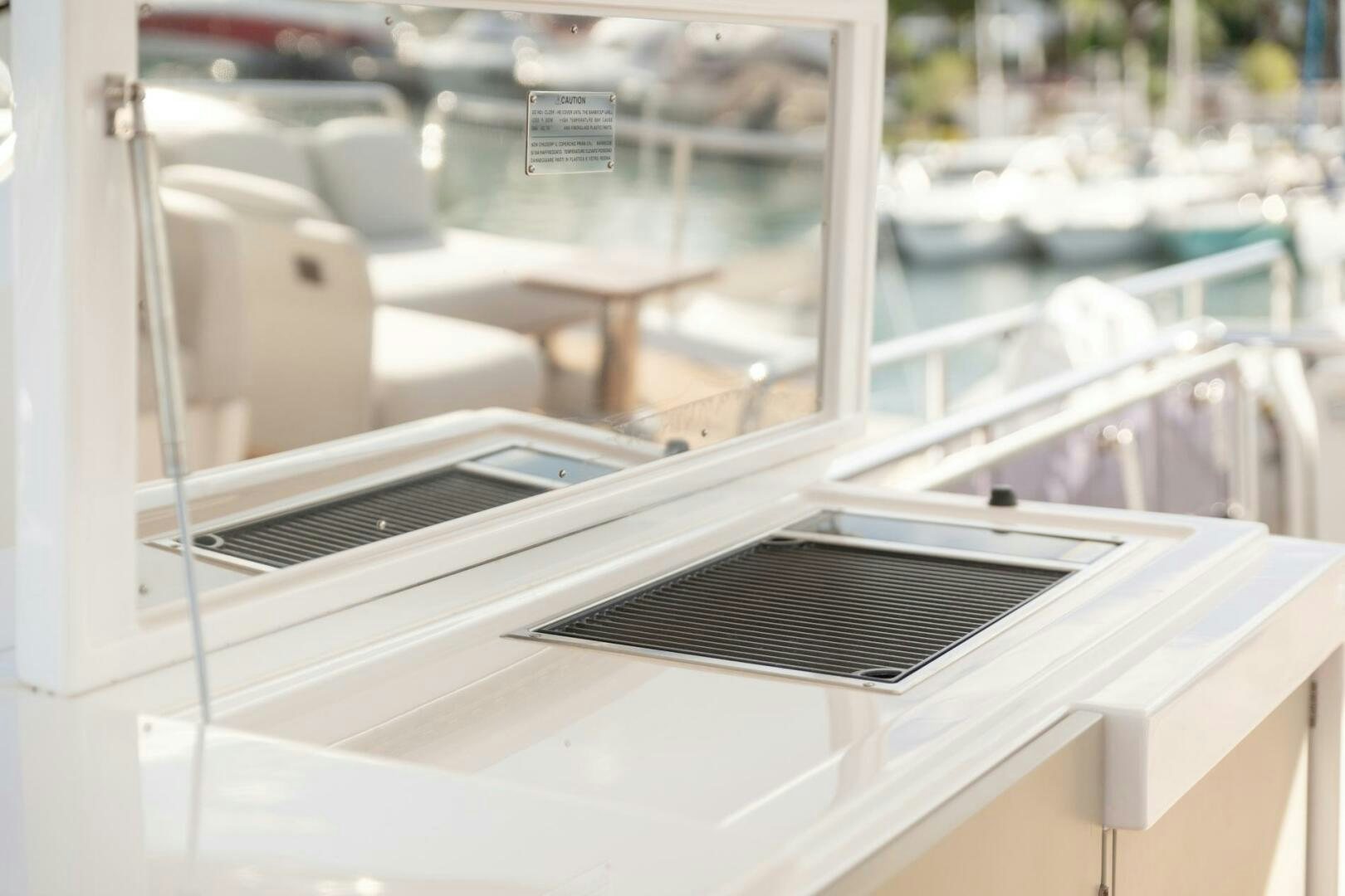 a white boat with a black frame aboard SOLSTICE Yacht for Sale