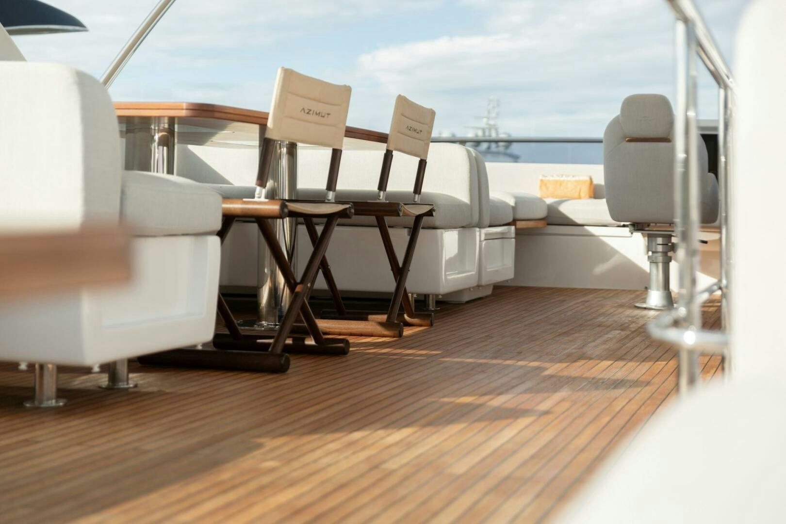 a room with chairs and a table aboard SOLSTICE Yacht for Sale