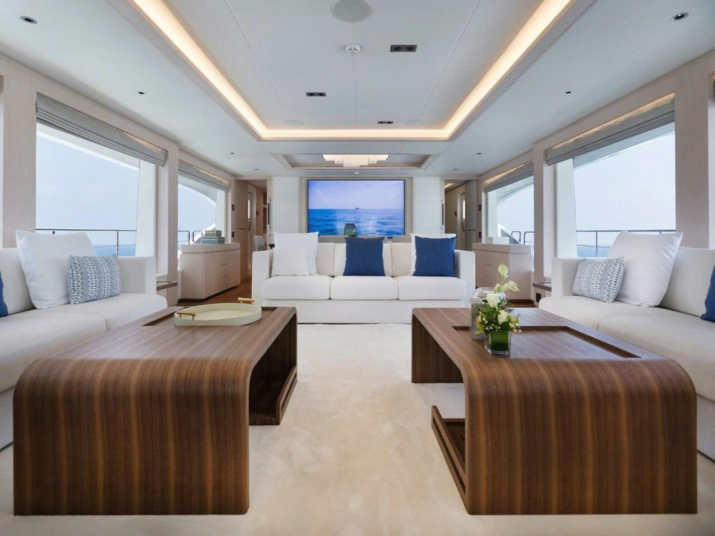 a room with a bed and a table aboard OCEAN VIEW Yacht for Sale