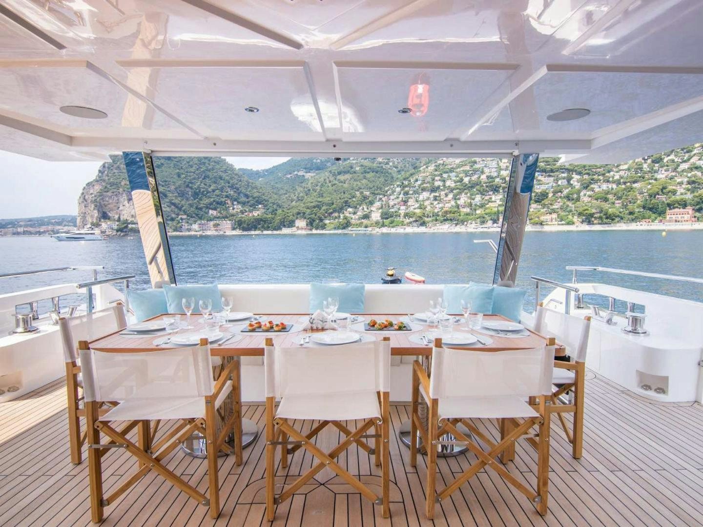 a table set for a meal aboard OCEAN VIEW Yacht for Sale