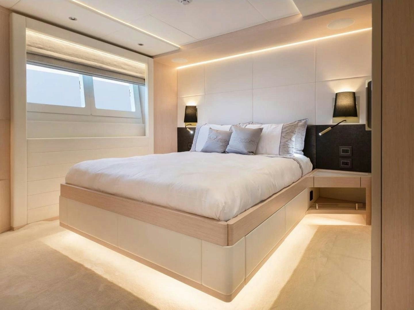a bed in a room aboard OCEAN VIEW Yacht for Sale