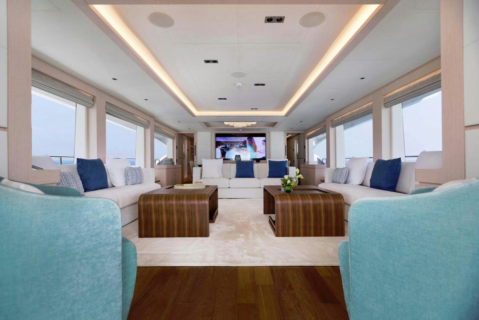 a living room with a couch and a television aboard OCEAN VIEW Yacht for Sale