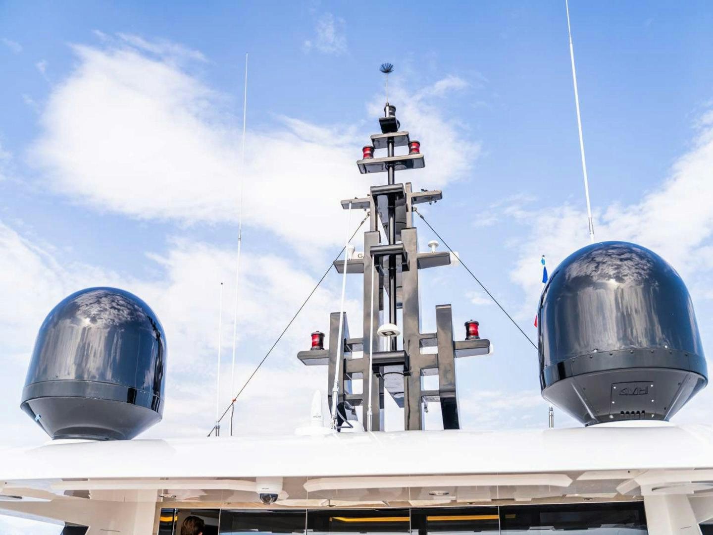 a large satellite dish on top of a building aboard OCEAN VIEW Yacht for Sale