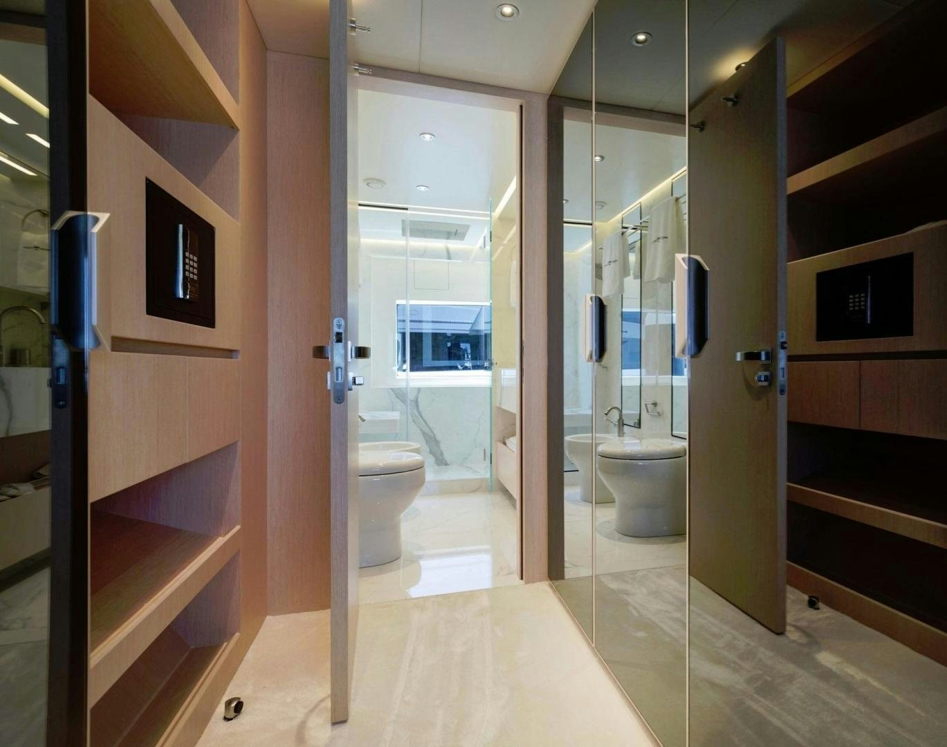 a bathroom with a glass shower aboard OCEAN VIEW Yacht for Sale