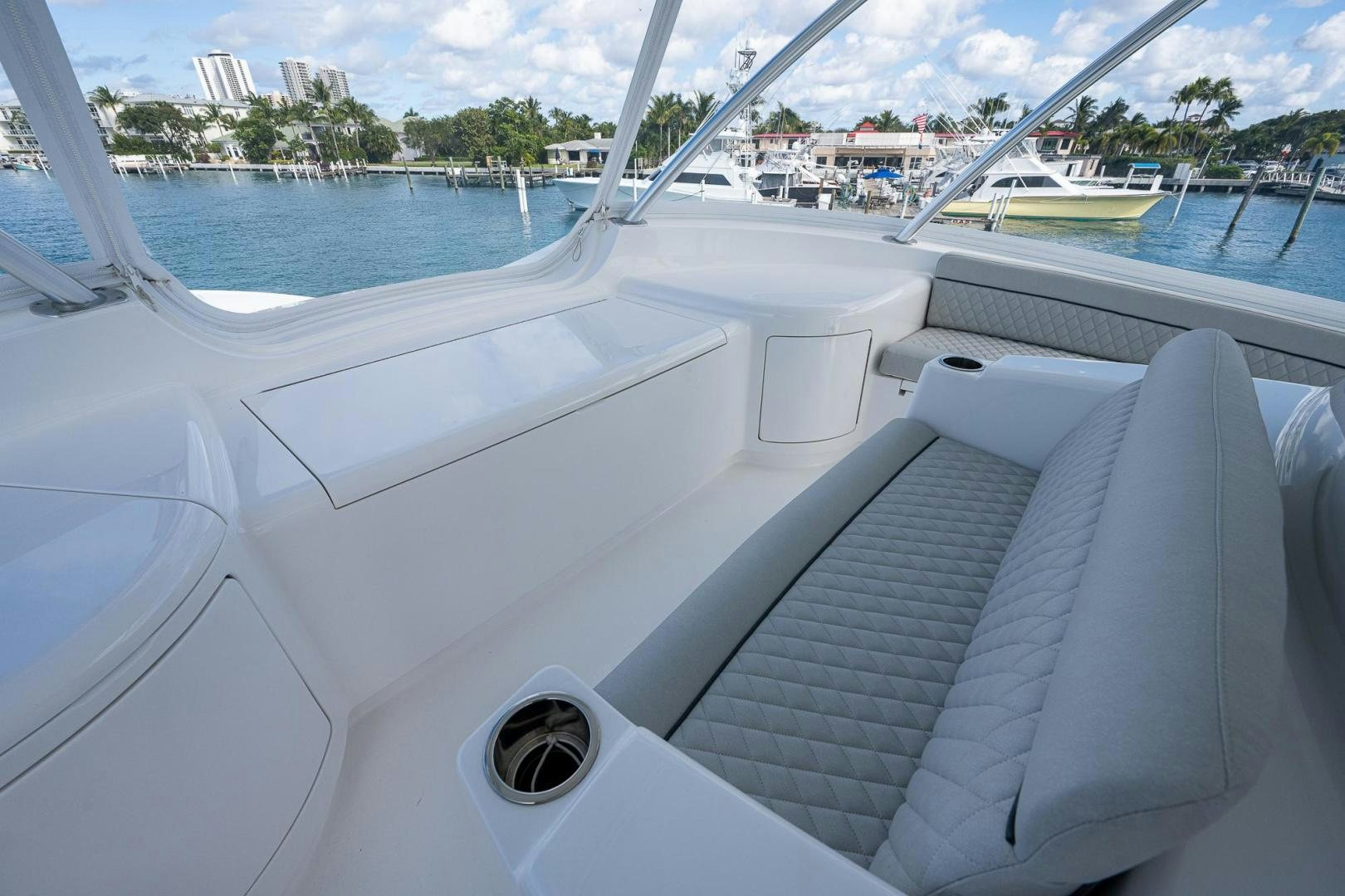 a white boat on a body of water aboard KEMOSABE Yacht for Sale