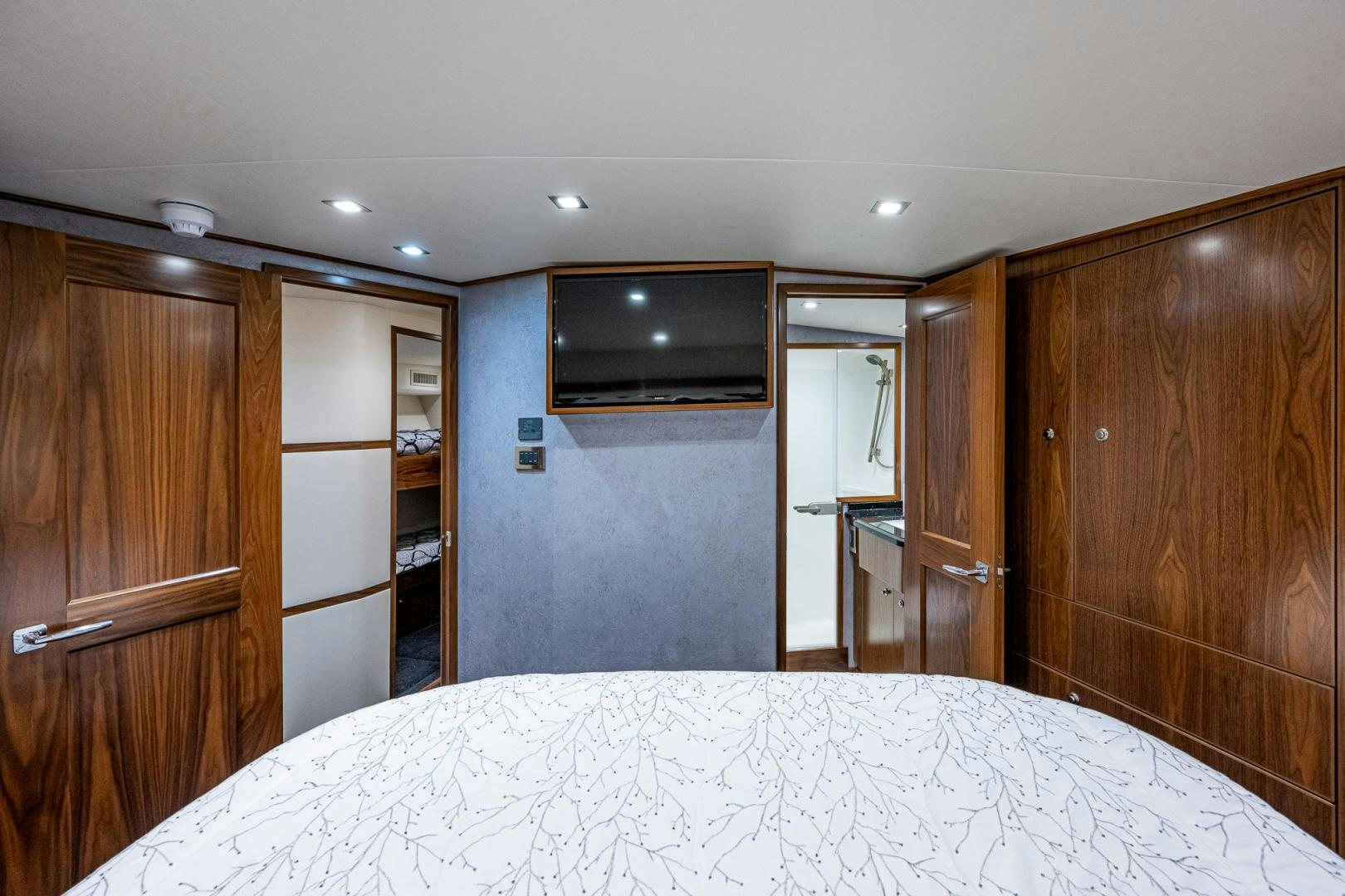 a large kitchen with a large white tablecloth aboard KEMOSABE Yacht for Sale