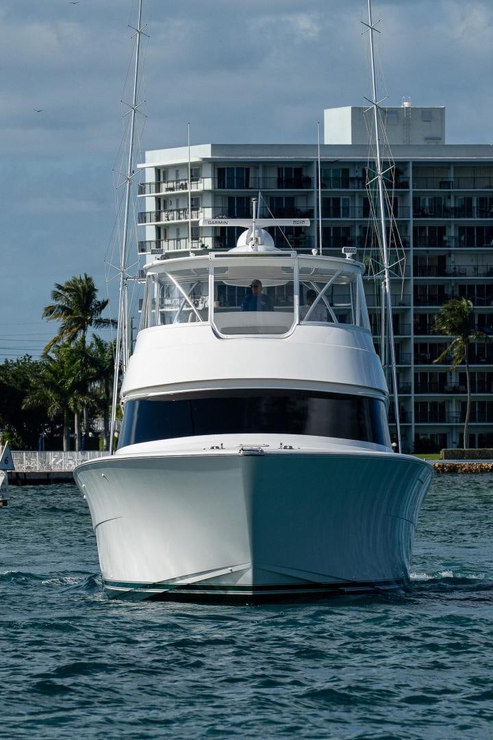 a white boat in the water aboard KEMOSABE Yacht for Sale
