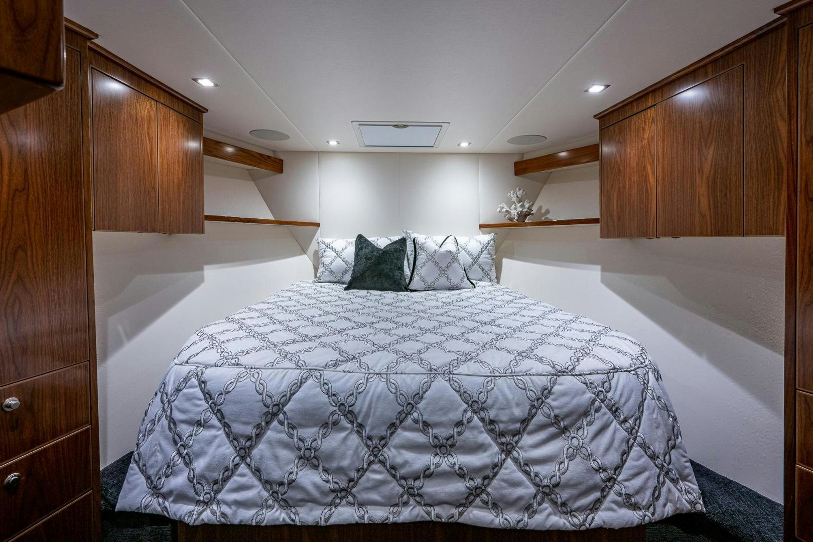 a bed with white sheets aboard KEMOSABE Yacht for Sale