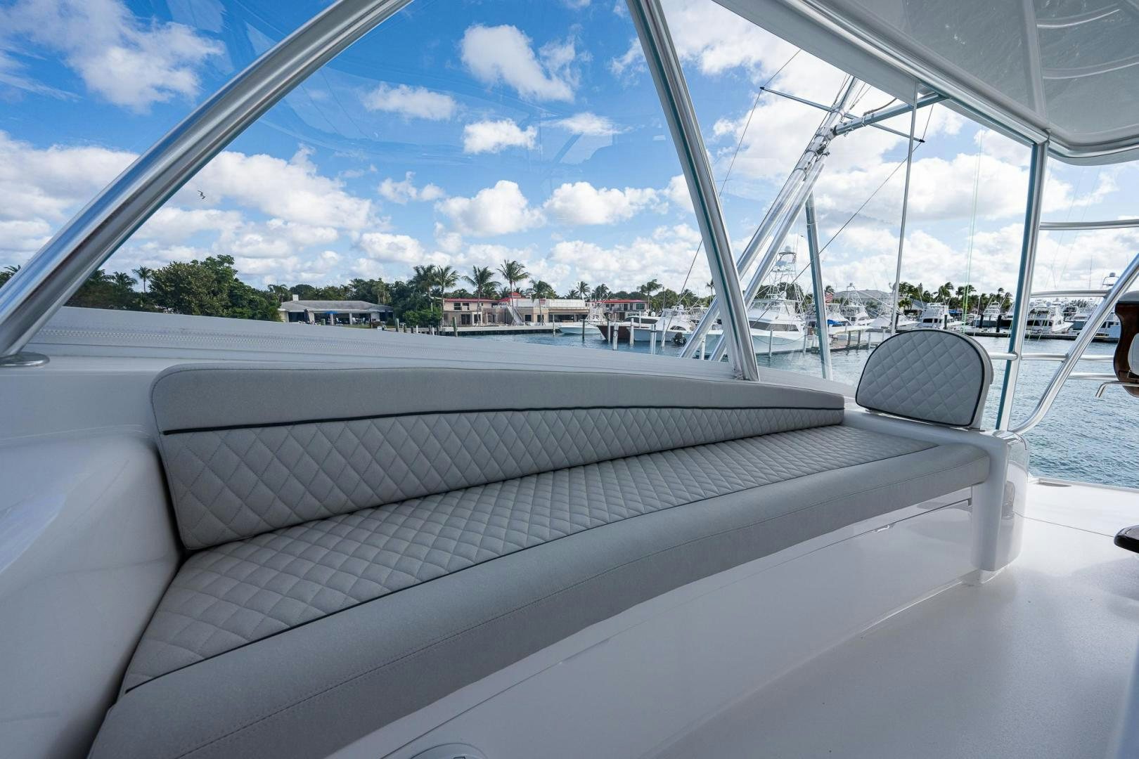 a white couch on a boat aboard KEMOSABE Yacht for Sale
