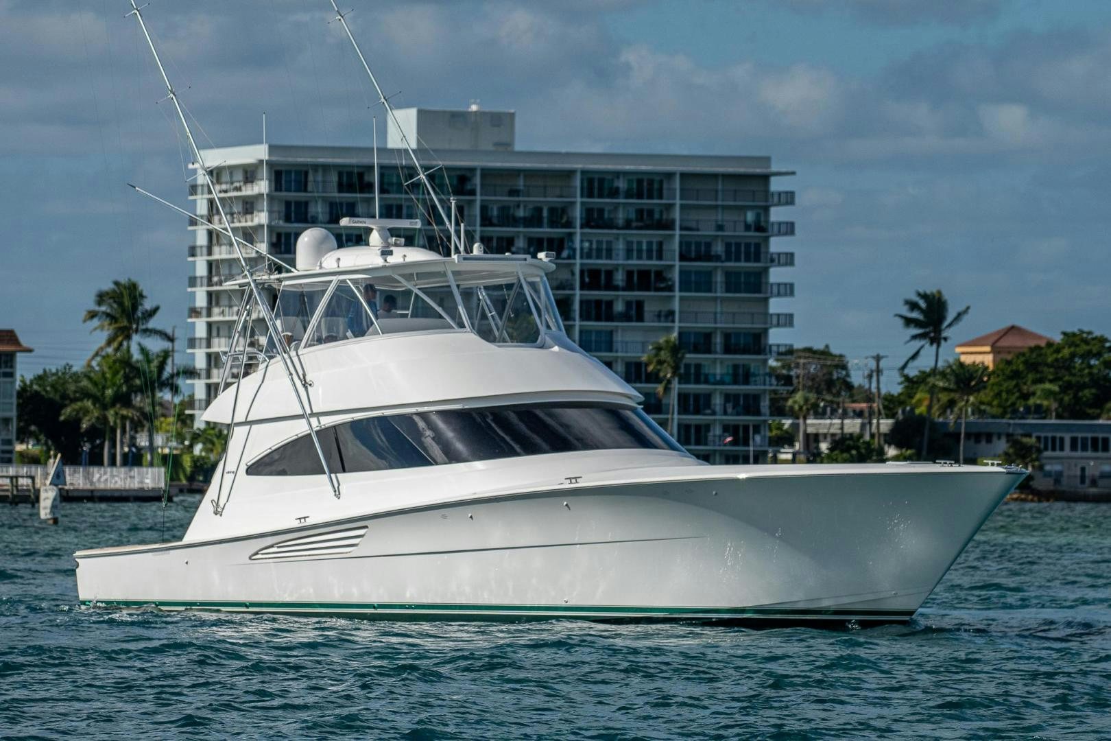 a white boat in the water aboard KEMOSABE Yacht for Sale