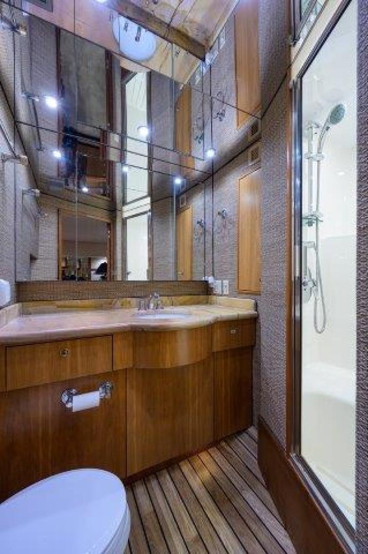 a bathroom with a sink and a toilet aboard THERAPY Yacht for Sale