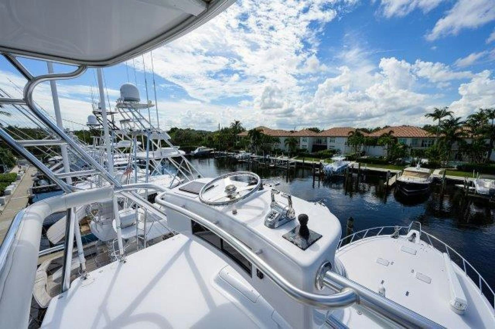 a group of boats are parked in a harbor aboard THERAPY Yacht for Sale