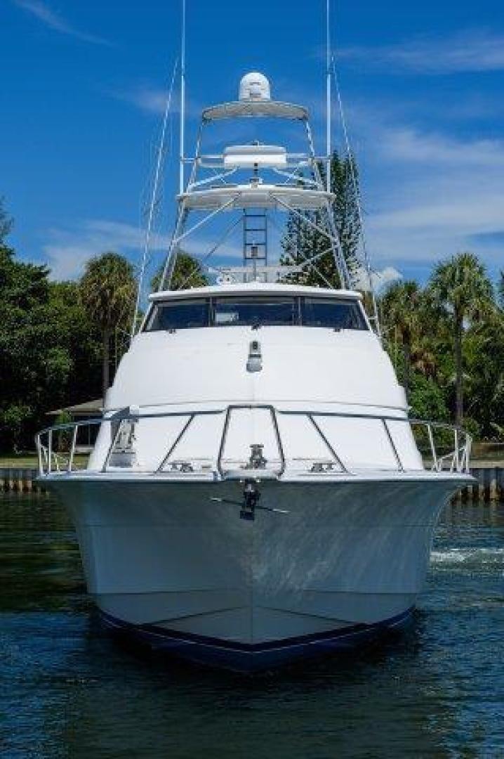 a large white boat in the water aboard THERAPY Yacht for Sale