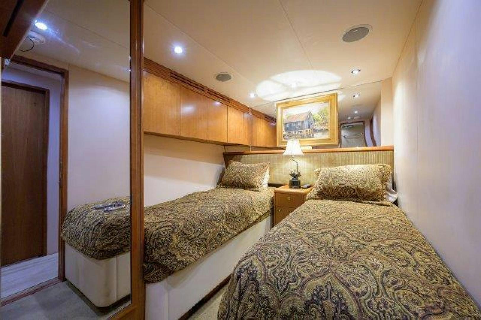 a couple of beds in a hotel room aboard THERAPY Yacht for Sale
