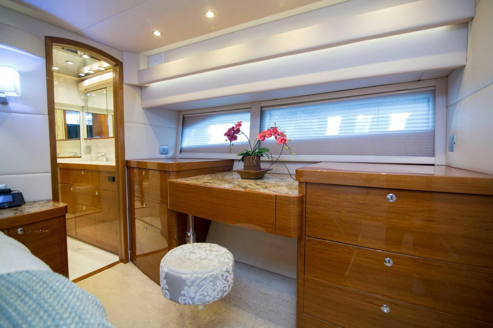 a room with a table and a window aboard PREDATOR Yacht for Sale