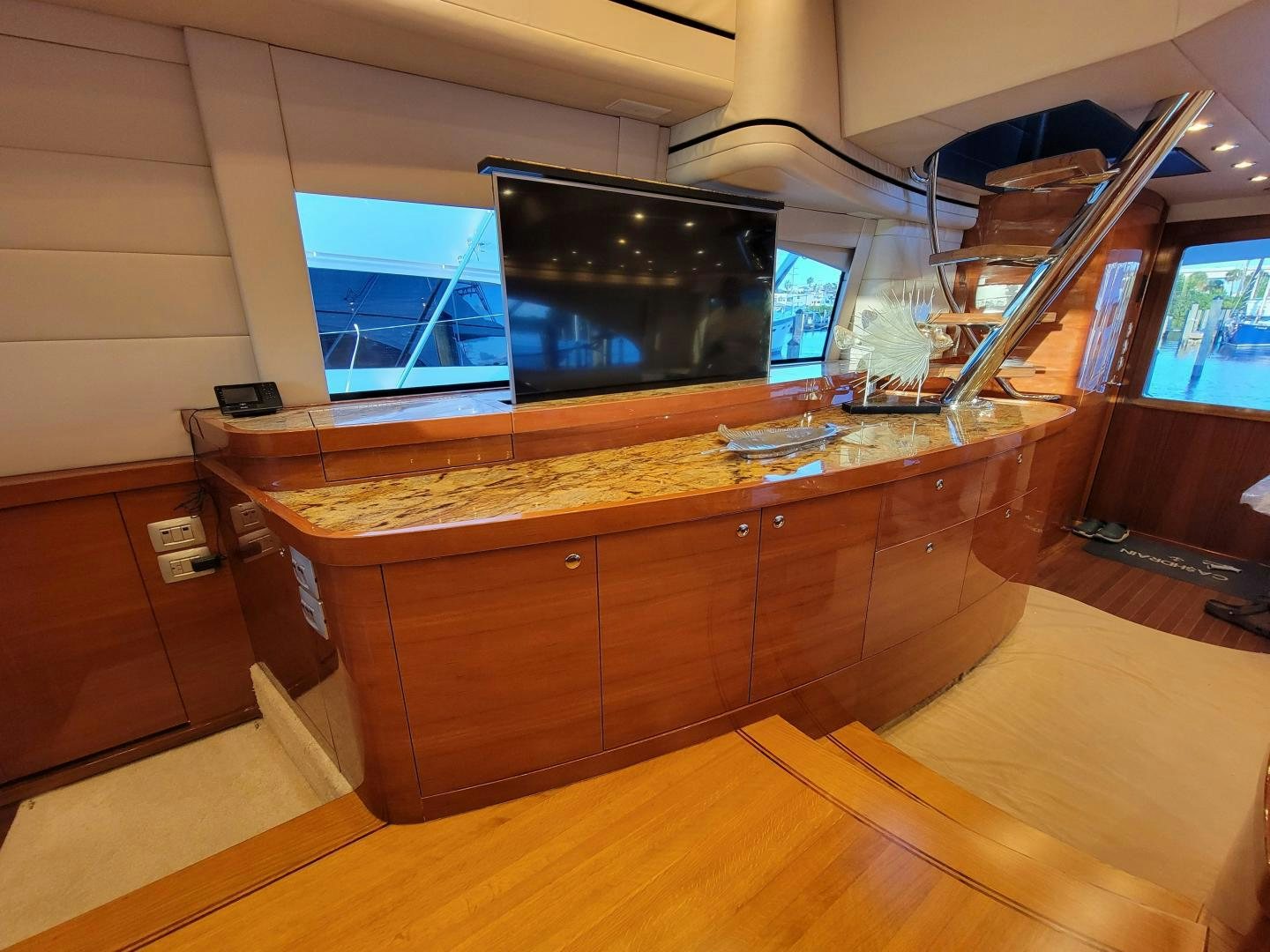 a kitchen with a counter and cabinets aboard PREDATOR Yacht for Sale