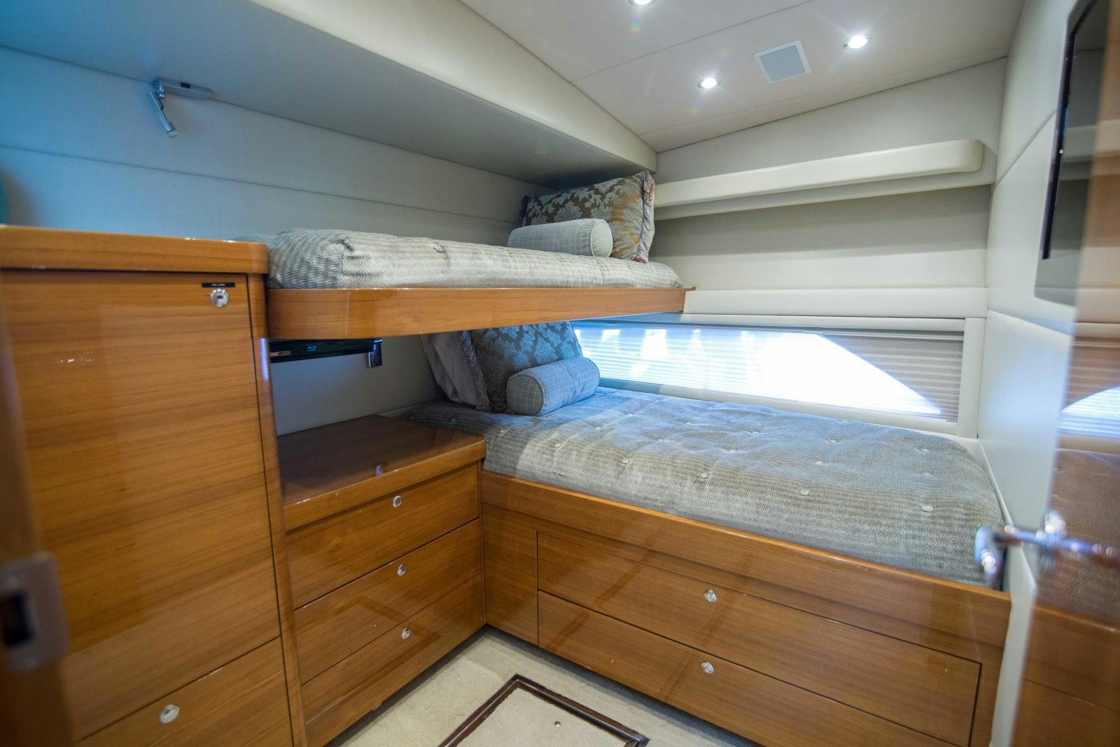 a bed in a room aboard PREDATOR Yacht for Sale